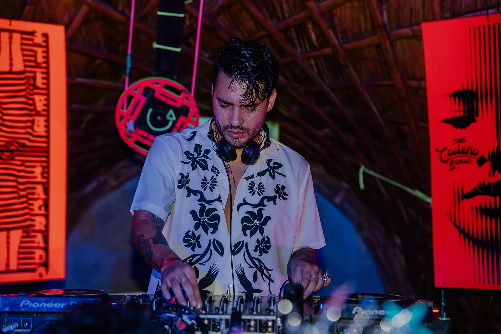 DJ booth in a classic floral shirt