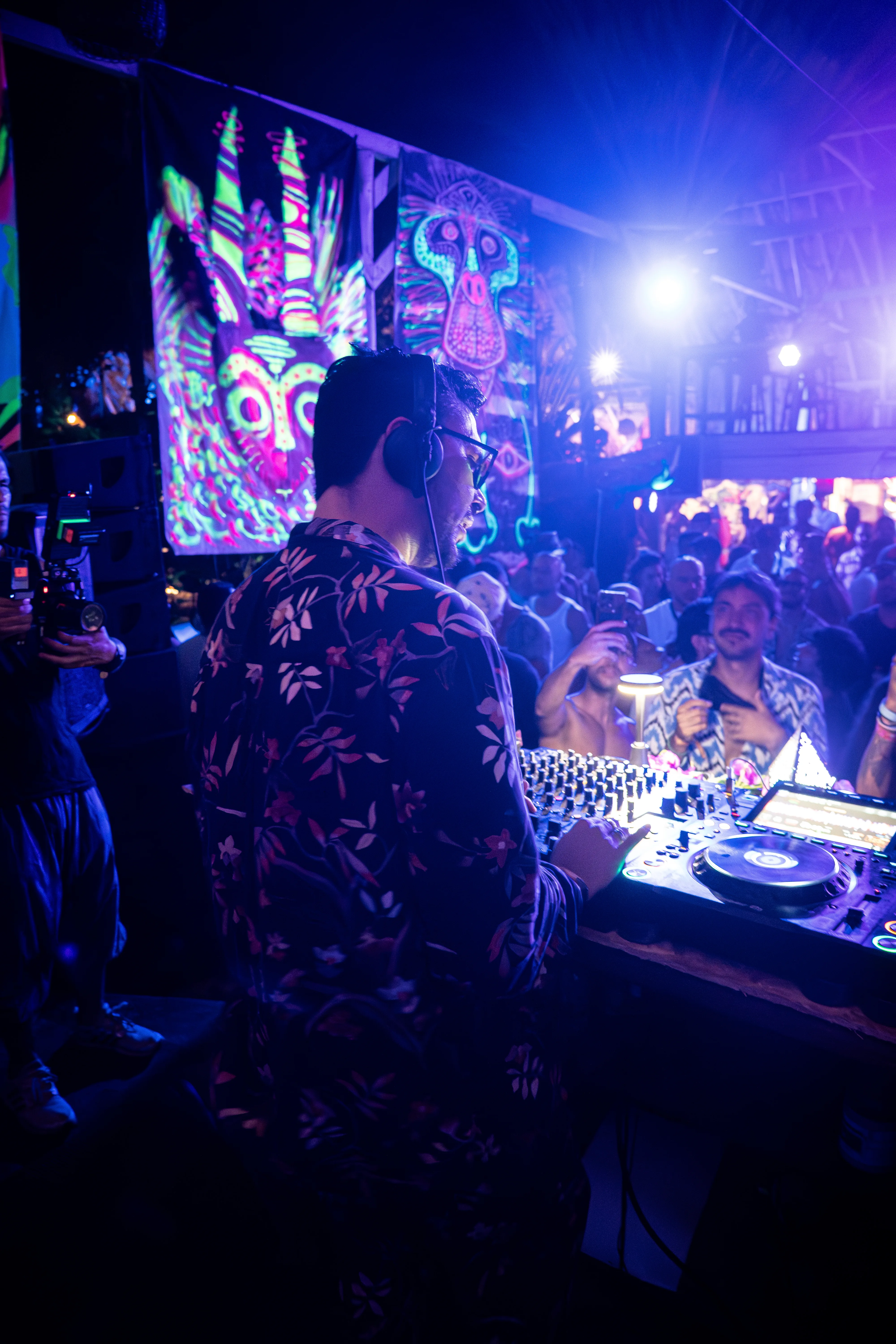Booth from behind, folk art and crowd